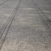 Flat roof covered with bitumen sheets